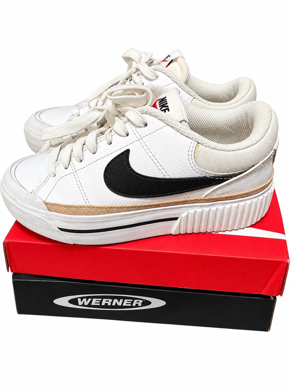 Nike Women’s White Sneakers with Black Swoosh and Gold Trim
